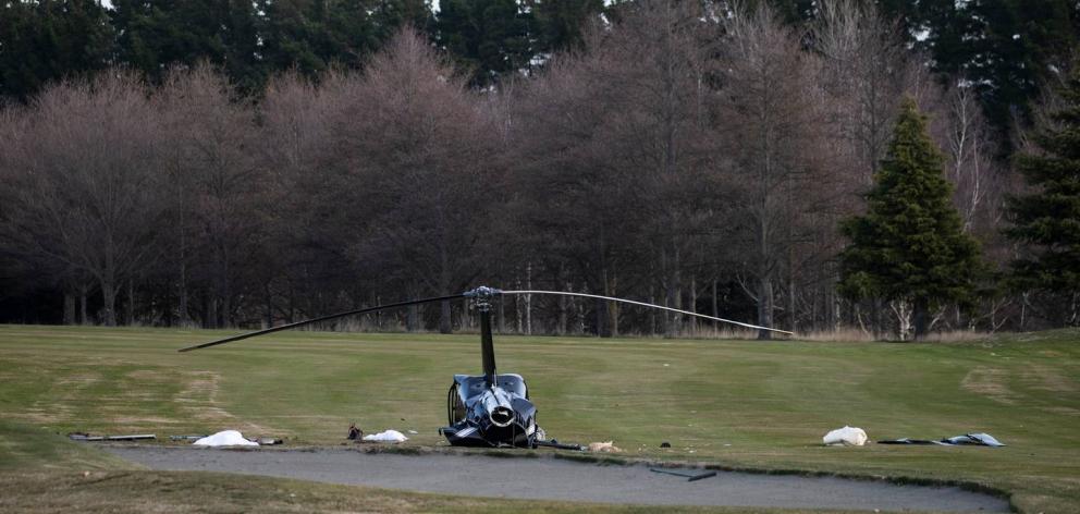 The helicopter crashed near a sand trap on the golf course at Terrace Downs Resort in Windwhistle...