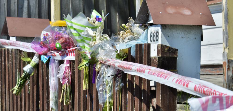 Flowers at the scene after the deaths of Anastasia Neve and David Clarke. Photo: Gerard O'Brien