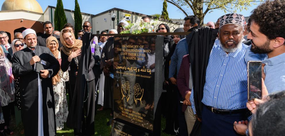 New Zealand Prime Minister Jacinda Ardern unveils a plaque at the Al Noor mosque in Christchurch...