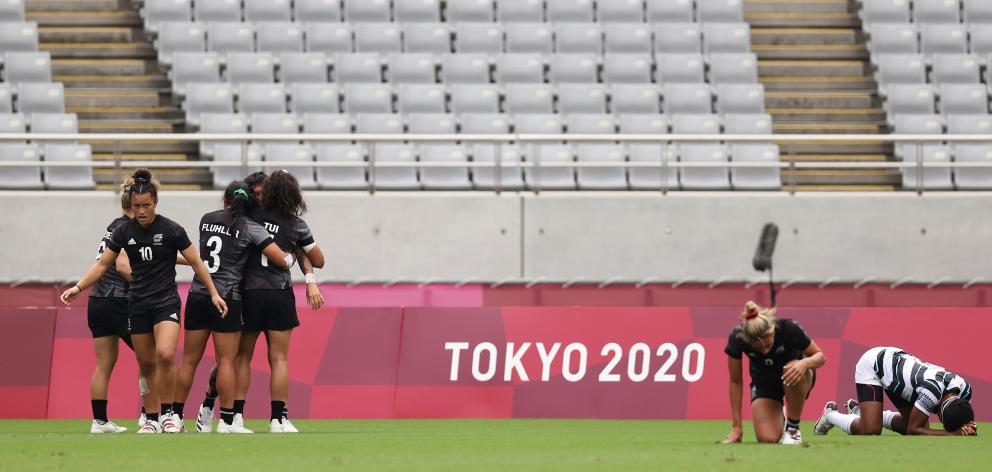 The Black Ferns Sevens celebrate during their epic struggle against Fiji in the Olympic semifinal...
