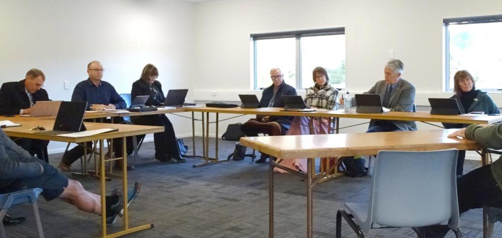 Wanaka Community Board members listen as Lakeland Adventures Wanaka director Michael Donald...