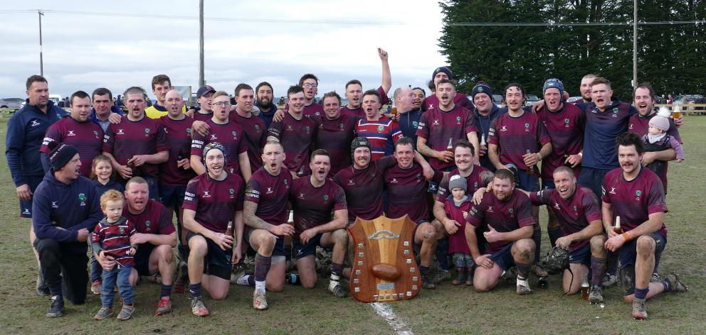 Clutha Valley celebrates after its win over Cromwell in the countrywide final at Clydevale on...