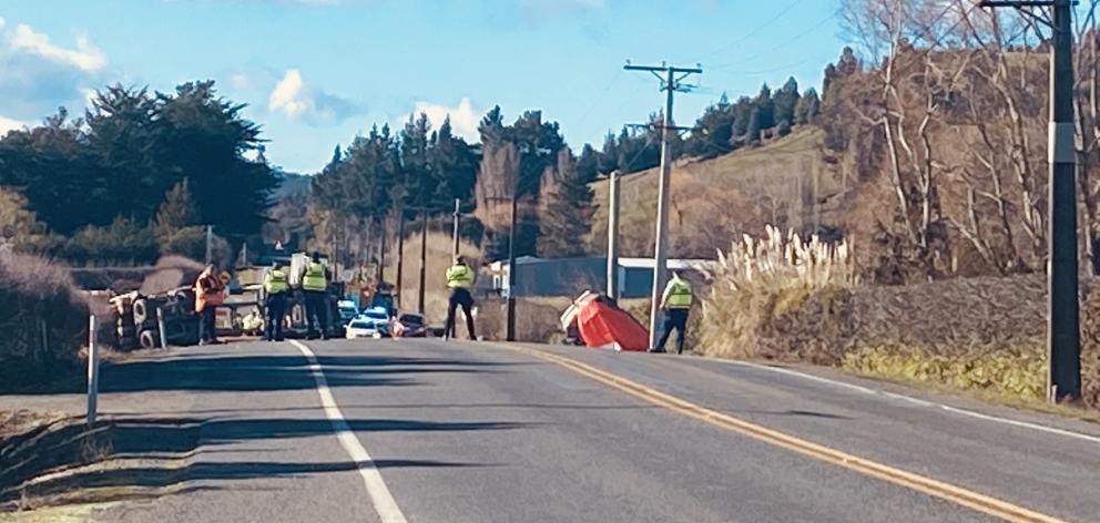 Emergency services at the scene of crash near East Taieri. Photo: Craig Baxter