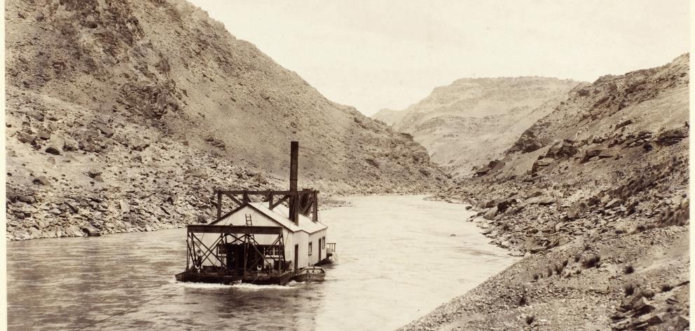 Manuherikia dredge operates on the Manuherikia River in the early 1900s. The first rights to take...