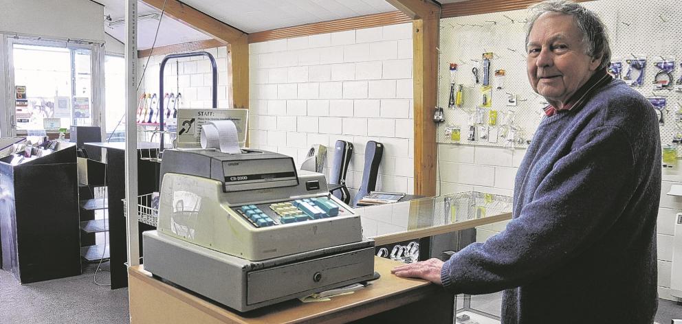 Tony Graham, of Graham Electronics, will ring up his last sale this week as he retires after 57 years on the job. PICTURE: Hokitika Guardian
