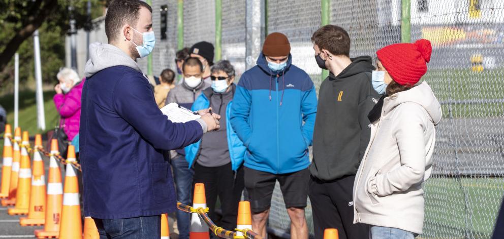 People wait in line to be tested for Covid-19 at Hataitai Park in Wellington. Photo: NZ Herald