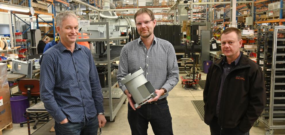 Escea co-founders (from left) Garth Milmine, Nigel Bamford and Alan McGregor in the factory —...