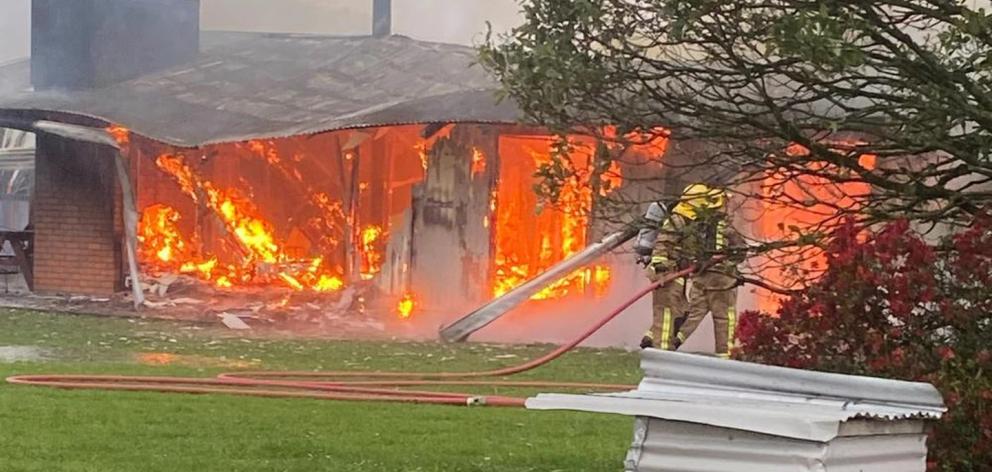 A family of eight that recently left Gloriavale has lost everything after the house they were staying in was hit by lightning and burst into flames. Photo / Supplied