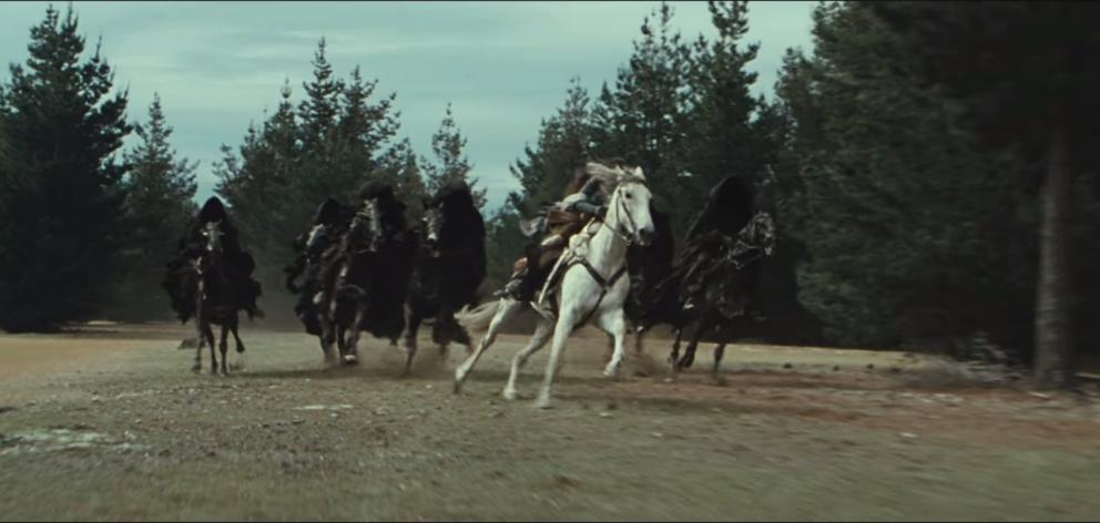 A scene from The Fellowship of the Ring movie filmed in a pine plantation near Tarras. Photo: New...