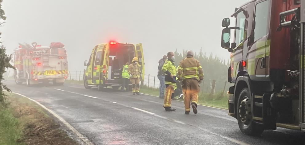 Emergency services at the scene of the crash this morning. Photo: Stephen Jaquiery