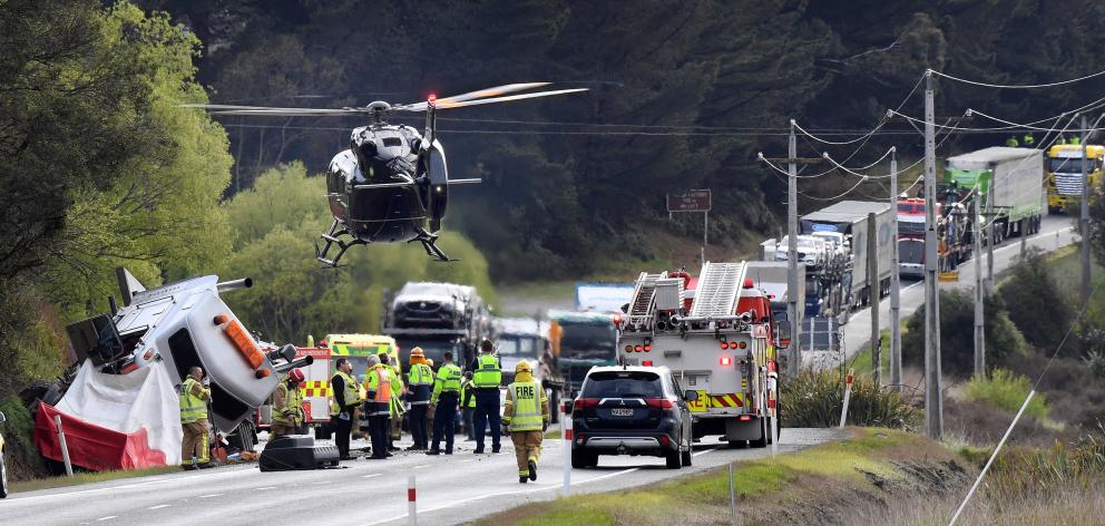 A rescue helicopter arrives on the scene of a fatal three-vehicle crash south of Hawksbury...