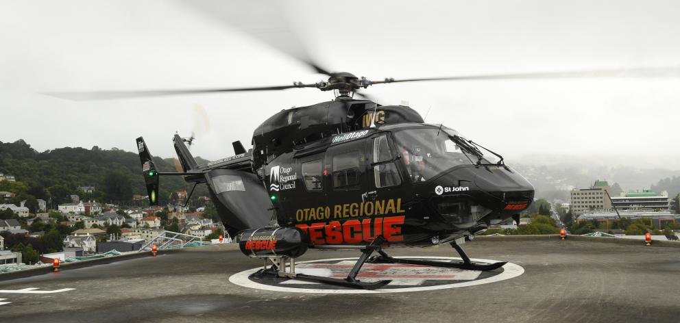 Helicopters Otago chief pilot Graeme Gale, and paramedics Doug Flett and Ian Ridley reflect on what a valuable addition the publicly funded Dunedin hospital helipad has been. Photo: Stephen Jaquiery