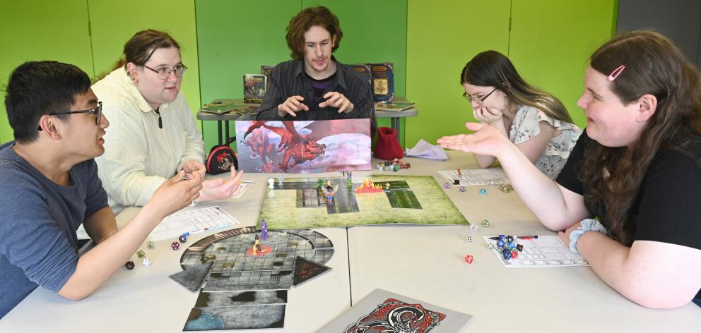 Playing Dungeons and Dragons at the OUSA Clubs and Society's building are executive members of...