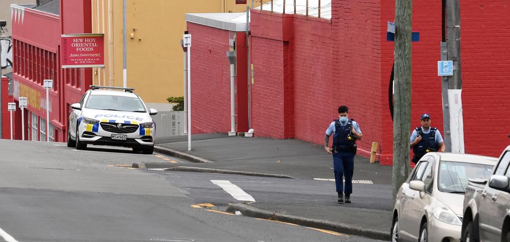 Police in Stafford St following the reported incident. Photo: Stephen Jaquiery Police in Stafford St following the reported incident. Photo: Stephen Jaquiery