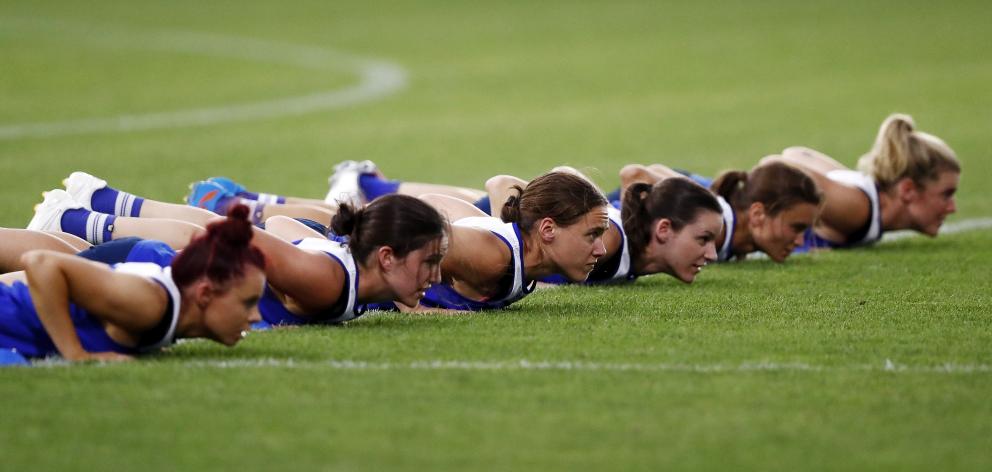 The North Melbourne Kangaroos AFL women’s team trains at Arden Street Oval. PHOTO: GETTY IMAGES