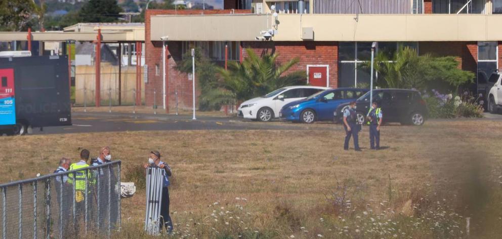 Emergency services respond after a woman and baby were struck by a freight train on Tuesday...