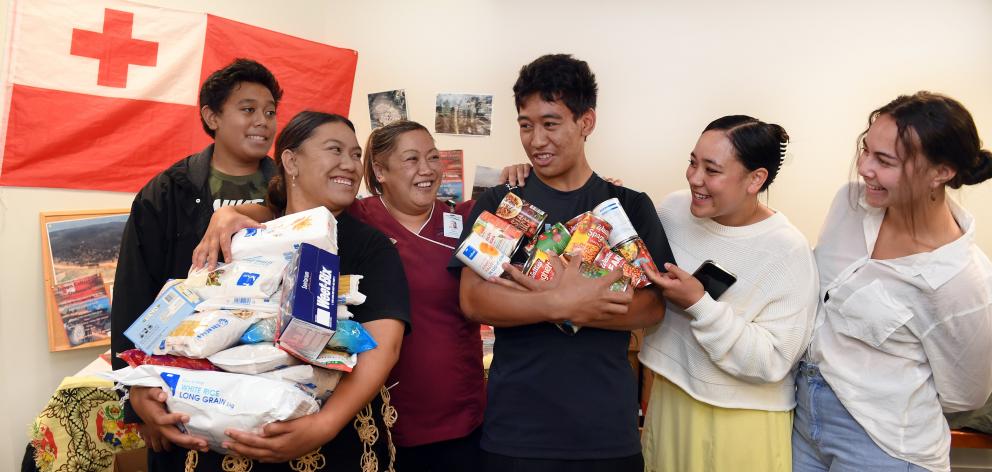 Collecting food and essential supplies for victims of the Tongan volcano and tsunami at Dunedin...
