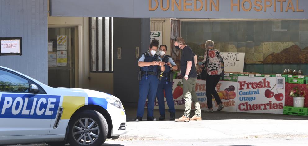  Police maintain a presence outside Dunedin Hospital after a shooting in Invercargill early...