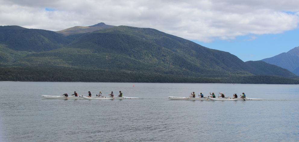 Te Rua o Te Moko, of Fiordland, competes with Te Piritahi Waka Ama Club, of Invercargill, at Te...