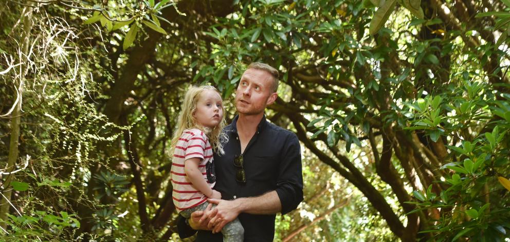 Sam Foley with his daughter Frankie (4) at the Rhododendron Dell in his beloved Dunedin Botanic...