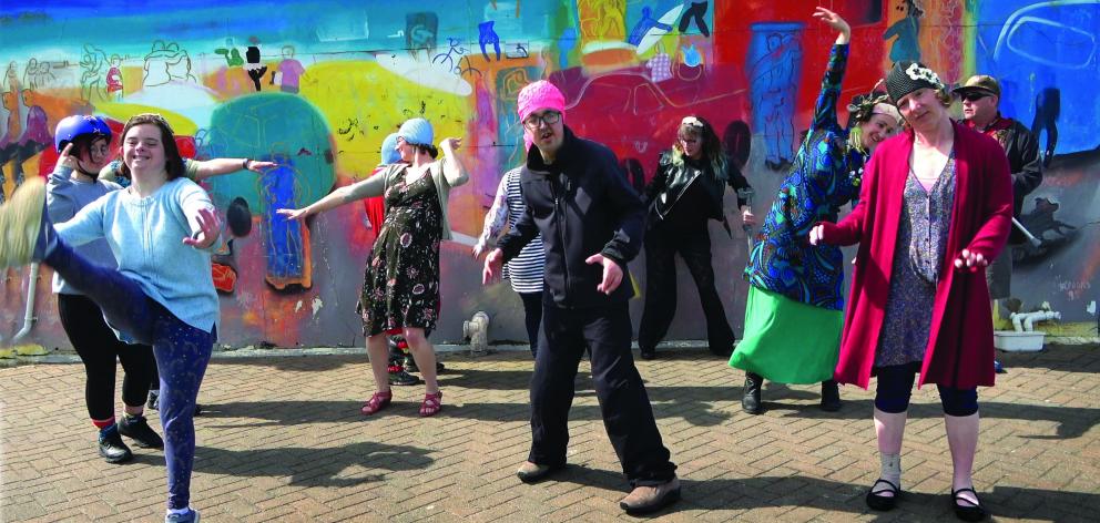 Members of Gasp! get their groove on at St Clair during filming. PHOTO: SUPPLIED