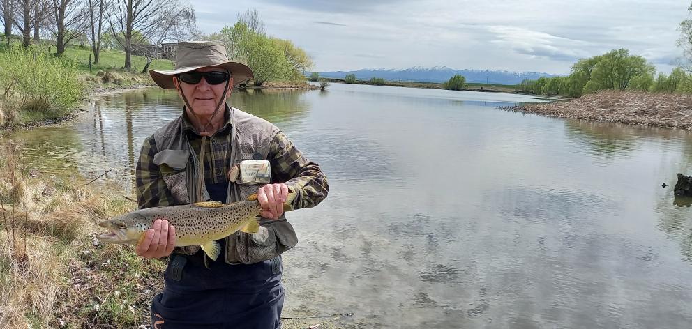 Mike Weddell holds a 2kg fish he caught on the Mathias Dam. PHOTO: SUPPLIED

