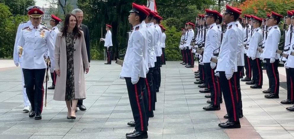 Prime Minister Jacinda Ardern with with Singapore leader Lee Hsien Loong inspecting the guard of...