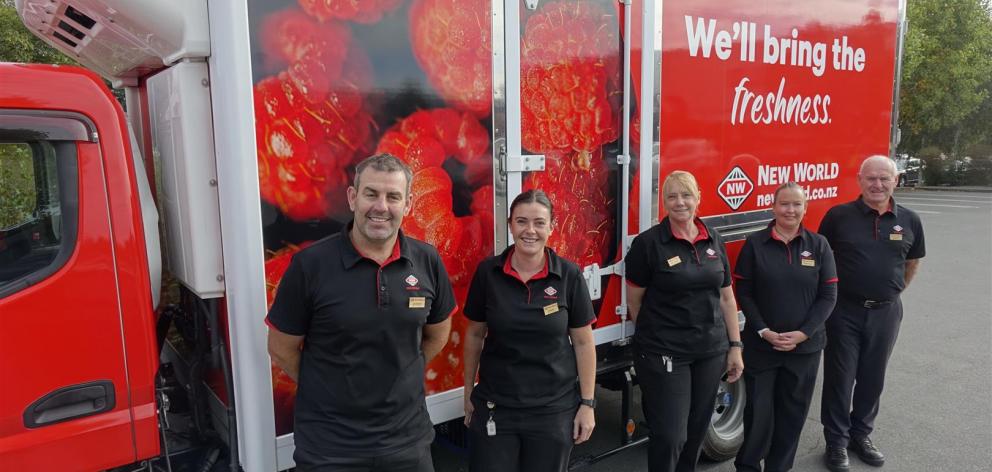 New World Ashburton shop owner/operators Jeremy and Emma Rooney, from left, online assistant...