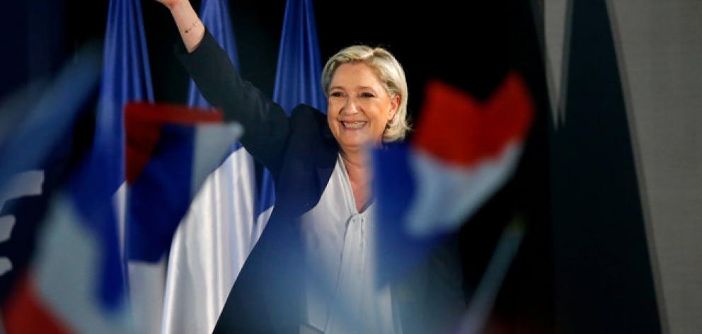 Voter surveys show Macron winning next Sunday with 59-60% of the vote, and Le Pen's plans to quit the EU and the euro are among the least popular policies in her platform. Photo: Reuters