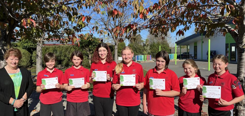 One World Education consultant Mary McRostie (left) visited Kaiapoi North School to present...