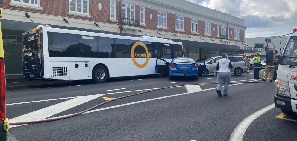 Two cars and a bus were involved in the crash. Photo: Craig Baxter Two cars and a bus were involved in the crash. Photo: Craig Baxter