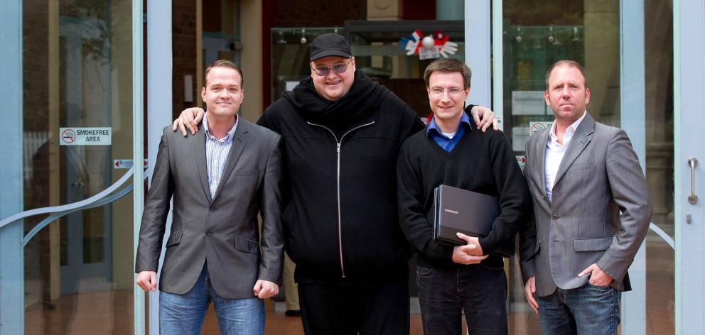 From left: Bram Van der Kolk, Kim Dotcom, Mathias Ortmann and Finn Batato outside the Auckland...