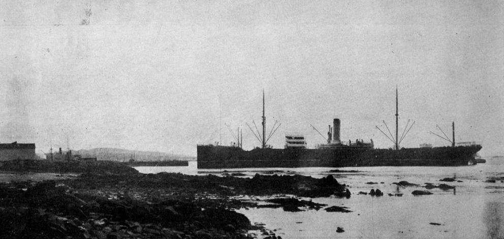 The SS Tasmania aground in Bluff Harbour. Caught by the ebb tide as she was nearing the wharf,...