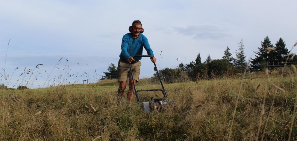 Ace cutter Dave Mclean cuts a swathe through long grass in preparation for the Leith Cross...