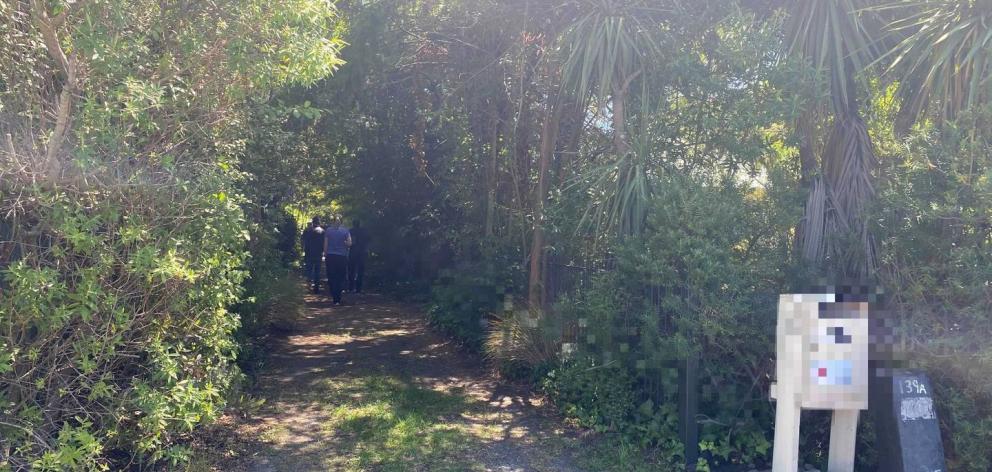 Police arrive at the scene of the murder in Papanui. Photo: Anna Leask