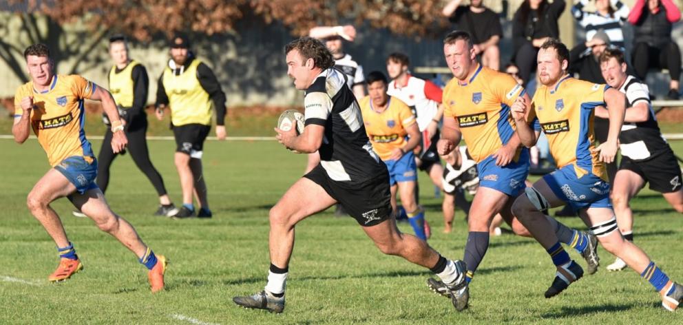 Waihora's Ryan Koning runs into a gap. Photo: Karen Casey