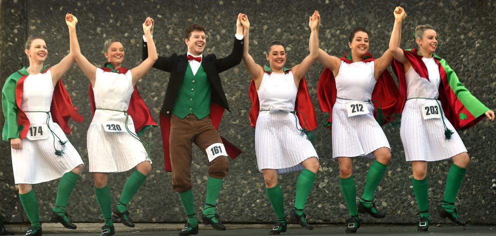 Moments before competing in the open Irish reel dancers (from left) Bridget Karton (26), of...