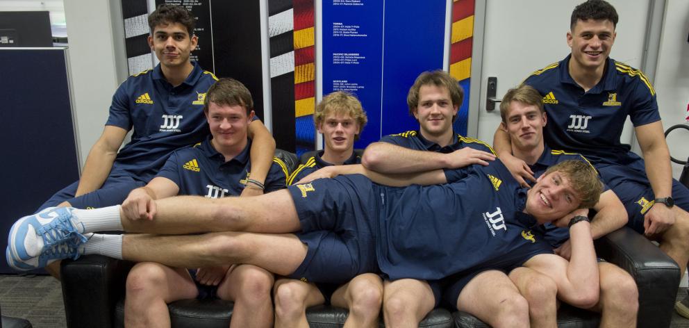 Towering lock Fabian Holland stretches out on his New Zealand and Highlanders under-20 team-mates...
