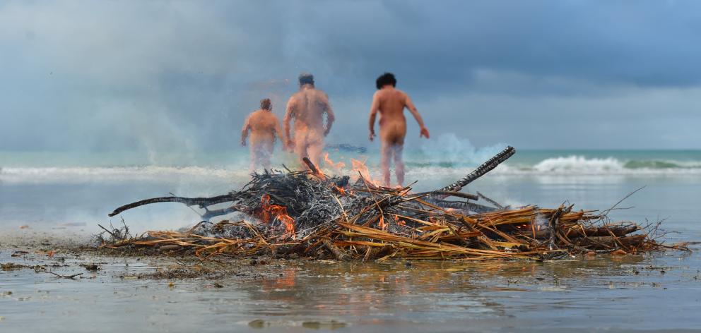 Hardy souls shed their winter woollies for a dip in the ocean at Warrington Beach for a Southern...