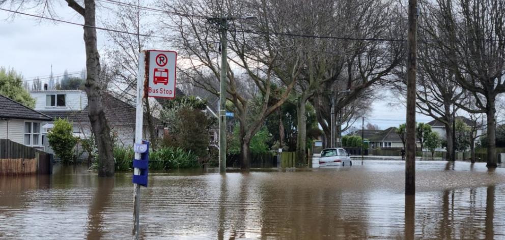 Flooding at the intersection of Bellbrook Crescent and Emmett Street in Shirley. Photo: RNZ /...
