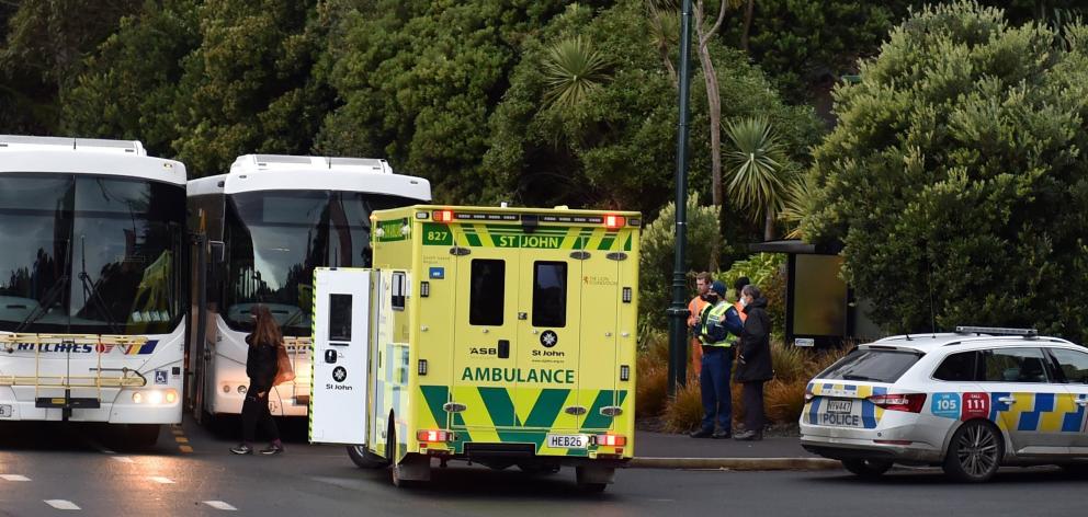 Police officers and an ambulance attend a bus crash in Portobello Rd yesterday. Photo: Gregor...