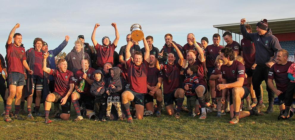 Clutha Valley celebrate their victory over Clutha Steamers in the Southern Region Rugby Final in...