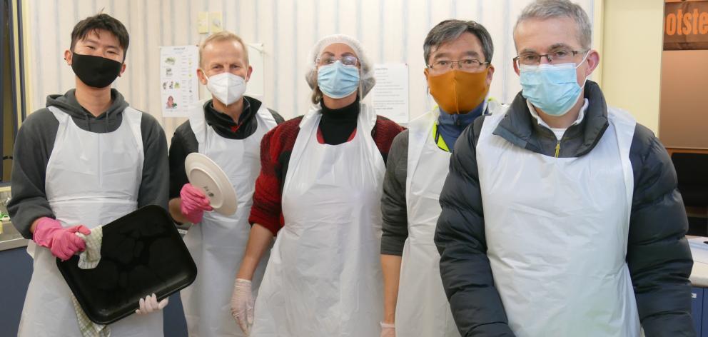 Pasta Cafe volunteers (from left) Basil Tan, Kim Wilkinson, Catherina Remers, David McNeill and...