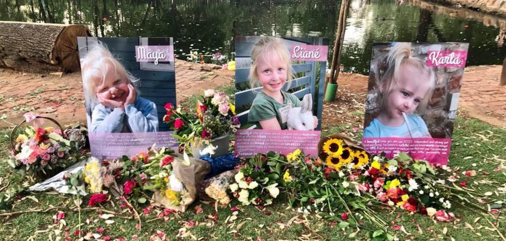 Tributes to 6-year-old Liané and 2-year-old twins Maya and Karla. Photo: Supplied via NZ Herald