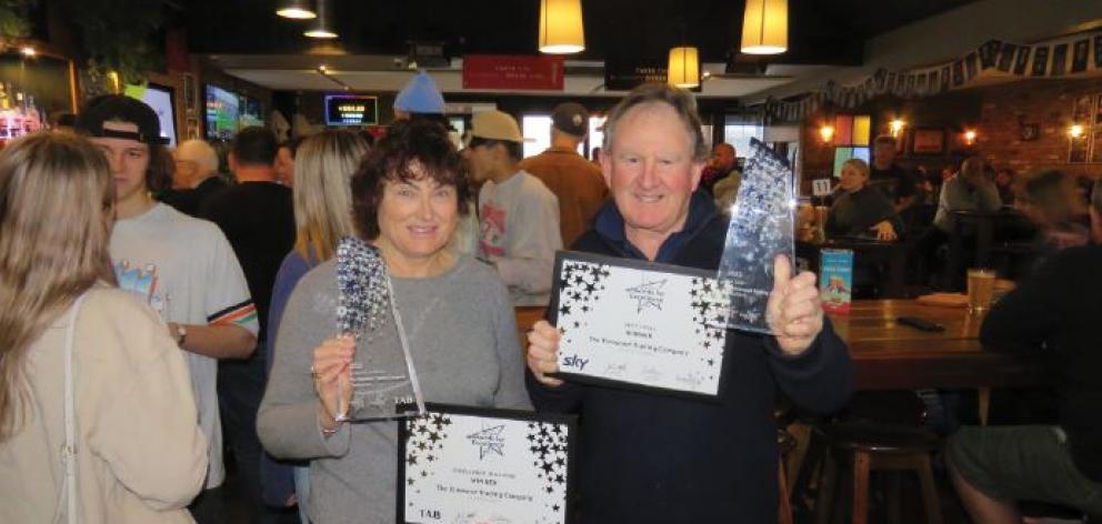 Naomi and Marty Fuller with their hospitality awards of excellence. Photo: Supplied