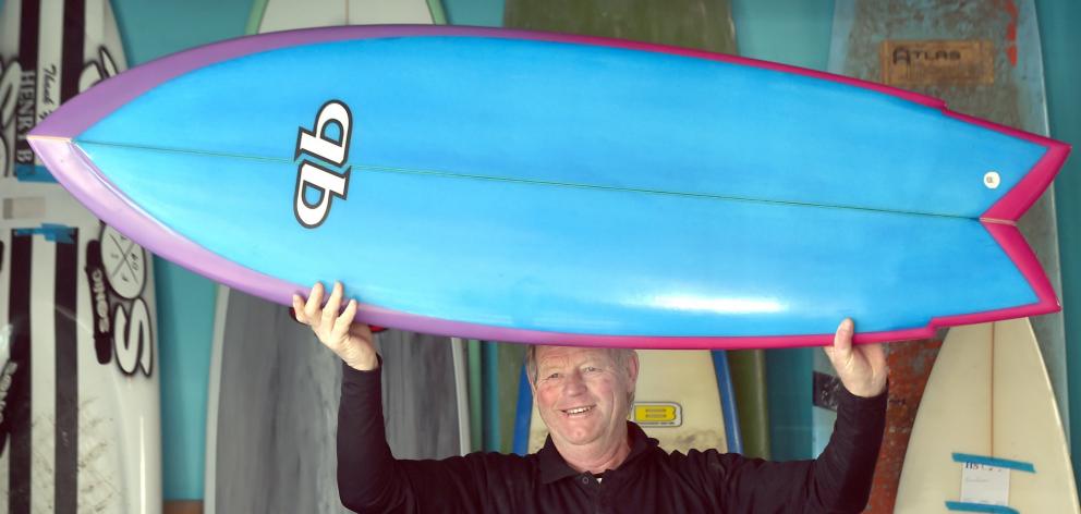 Graham Carse hangs up his board in his Caversham shop Quarry Beach Surfboards, which will close...