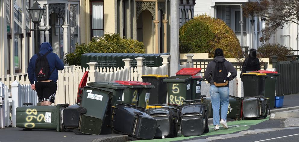 Wheelie bins blown over in Cumberland St, North Dunedin. Property managers have raised concerns...