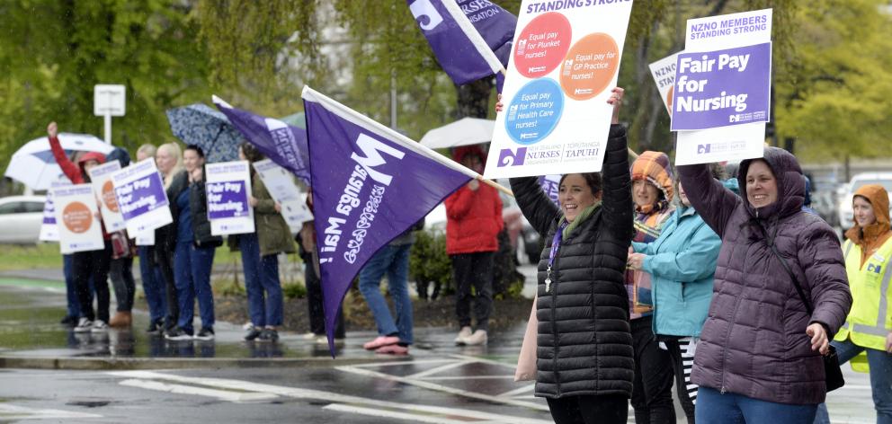 Plunket nurses Candice Adam (left) and Kelly Morrissey were among about 30 other nurses striking...