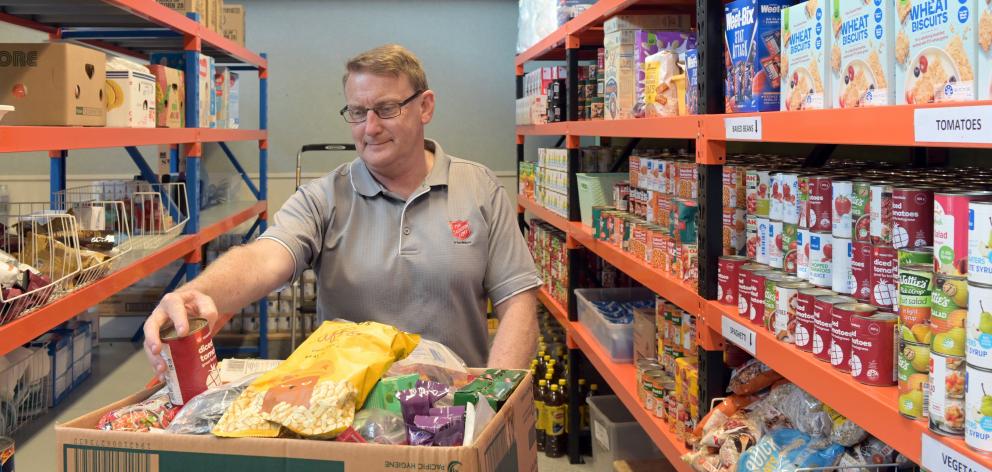 The Salvation Army Corps’ David McEwen at the Salvation Army Foodbank last month. PHOTO: LINDA...