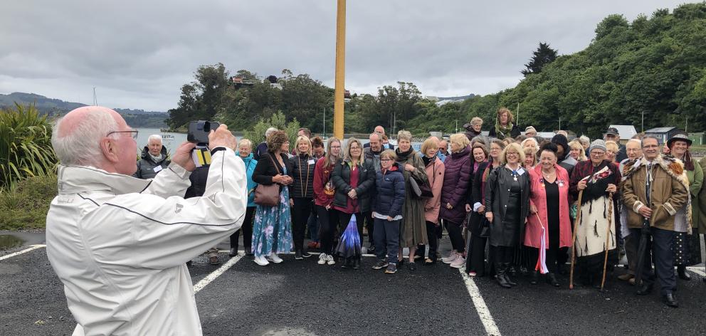 Corran Munro takes a photo of descendants of Otago's first Polish settlers at Back Beach, where their ancestors arrived 150 years ago onboard the ship Palmerston.